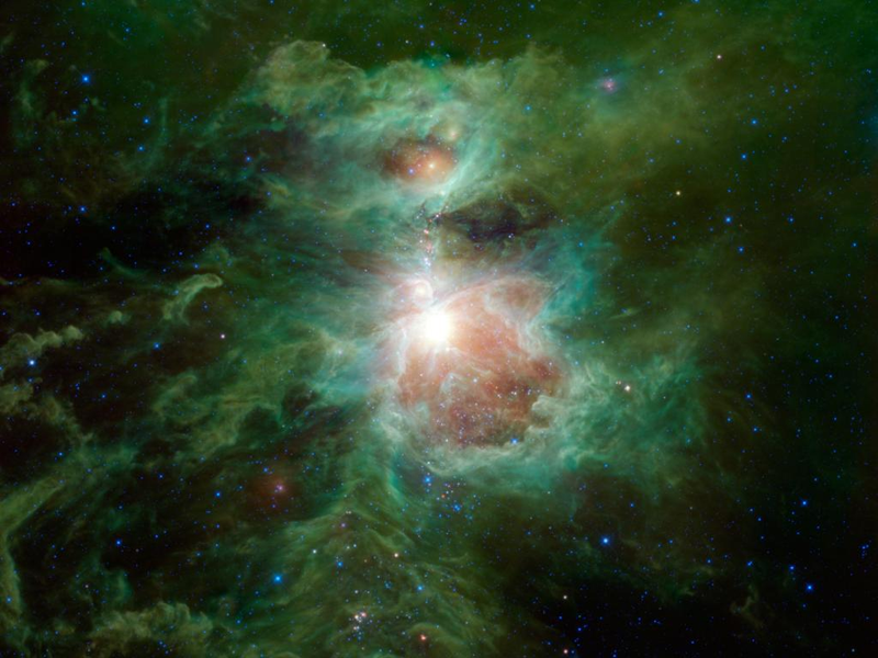 Illustration for article titled The first photo of the Orion Nebula compared to one taken by an iPhone